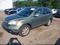 2009 Honda CR-V — photo 2 of 11 | VIN 5J6RE48789L058154