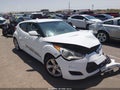 2014 Hyundai Veloster — photo 13 of 16 | VIN KMHTC6AD8EU213346
