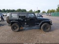 2008 Jeep Wrangler Unlimited — photo 13 of 16 | VIN 1J4GA59198L503440
