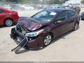 2018 Kia Forte — photo 2 of 17 | VIN 3KPFL4A71JE275518