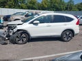 2015 Honda CR-V — photo 15 of 17 | VIN 5J6RM3H97FL020358