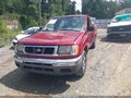 2000 Nissan Frontier — photo 2 of 16 | VIN 1N6DD26S2YC408159