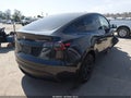 2024 Tesla Model Y — photo 4 of 17 | VIN 7SAYGDED5RF131413