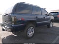 2003 Chevrolet Tahoe — photo 4 of 11 | VIN 1GNEK13T63J337502