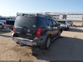 2015 Nissan Xterra — photo 4 of 15 | VIN 5N1AN0NU1FN666261