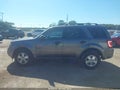 2011 Ford Escape — photo 14 of 16 | VIN 1FMCU0D70BKB97411