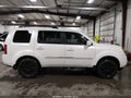 2015 Honda Pilot — photo 14 of 19 | VIN 5FNYF4H94FB024713