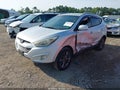 2014 Hyundai Tucson — photo 2 of 16 | VIN KM8JUCAG9EU826556