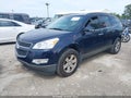 2012 Chevrolet Traverse — photo 2 of 11 | VIN 1GNKVGED9CJ235999