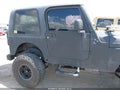 2005 Jeep Wrangler — photo 13 of 16 | VIN 1J4FA29155P325993