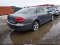 2014 Volkswagen Passat — photo 4 of 16 | VIN 1VWBP7A30EC001836