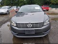 2014 Volkswagen Passat — photo 6 of 16 | VIN 1VWBP7A30EC001836