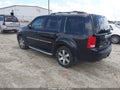 2014 Honda Pilot — photo 3 of 17 | VIN 5FNYF4H9XEB046276