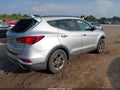 2017 Hyundai Santa Fe — photo 4 of 15 | VIN 5XYZU3LBXHG411650