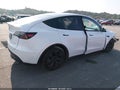 2024 Tesla Model Y — photo 4 of 15 | VIN 7SAYGDEE4RF177095