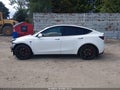 2021 Tesla Model Y — photo 15 of 19 | VIN 5YJYGDEF7MF075529