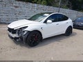 2021 Tesla Model Y — photo 2 of 19 | VIN 5YJYGDEF7MF075529
