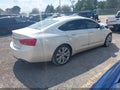 2014 Chevrolet Impala — photo 4 of 15 | VIN 1G1155S39EU110001
