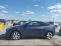 2024 Tesla Model Y — photo 13 of 20 | VIN 7SAYGDEE7RA243569