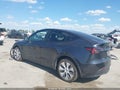 2024 Tesla Model Y — photo 3 of 20 | VIN 7SAYGDEE7RA243569