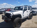 2017 Jeep Wrangler Unlimited — photo 2 of 16 | VIN 1C4BJWDG9HL598194