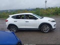 2018 Hyundai Tucson — photo 12 of 16 | VIN KM8J2CA46JU673852