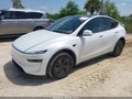 2026 Tesla Model Y — photo 2 of 17 | VIN 7SAYGDED1TA417070