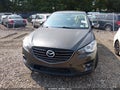 2016 Mazda CX-5 — photo 11 of 16 | VIN JM3KE4CY7G0838742