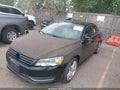 2014 Volkswagen Passat — photo 2 of 11 | VIN 1VWBN7A33EC059588