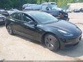 2022 Tesla Model 3 — photo 1 of 15 | VIN 5YJ3E1EA9NF122208