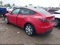2023 Tesla Model Y — photo 3 of 14 | VIN 7SAYGDEE6PF692547