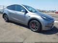 2025 Tesla Model Y — photo 1 of 15 | VIN 7SAYGDED6SF226326