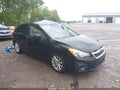 2014 Subaru Impreza — photo 1 of 16 | VIN JF1GPAB63E8257587