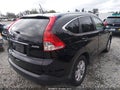2014 Honda CR-V — photo 4 of 18 | VIN 2HKRM4H73EH658880