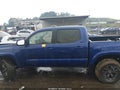 2023 Toyota Tacoma — photo 13 of 16 | VIN 3TYCZ5ANXPT161090