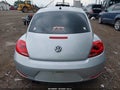 2014 Volkswagen Beetle — photo 16 of 16 | VIN 3VWFP7AT4EM620102