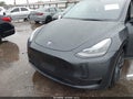 2024 Tesla Model Y — photo 10 of 18 | VIN 7SAYGDED5RF185097