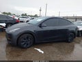 2024 Tesla Model Y — photo 14 of 18 | VIN 7SAYGDED5RF185097