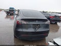 2024 Tesla Model Y — photo 16 of 18 | VIN 7SAYGDED5RF185097