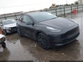 2024 Tesla Model Y — photo 1 of 18 | VIN 7SAYGDED5RF185097