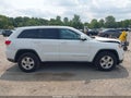 2014 Jeep Grand Cherokee — photo 13 of 16 | VIN 1C4RJFAG7EC316679