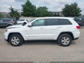 2014 Jeep Grand Cherokee — photo 14 of 16 | VIN 1C4RJFAG7EC316679