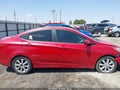 2013 Hyundai Accent — photo 13 of 16 | VIN KMHCU4AE2DU463285