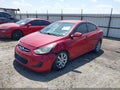 2013 Hyundai Accent — photo 2 of 16 | VIN KMHCU4AE2DU463285
