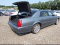 2004 Cadillac Deville — photo 4 of 11 | VIN 1G6KF57974U157003