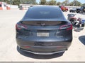 2025 Tesla Model Y — photo 16 of 23 | VIN 7SAYGAEE2SF295750