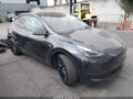 2024 Tesla Model Y — photo 1 of 21 | VIN 7SAYGDEE1RF146158
