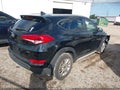 2017 Hyundai Tucson — photo 4 of 17 | VIN KM8J3CA49HU466735