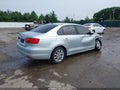 2012 Volkswagen Jetta — photo 4 of 16 | VIN 3VWDX7AJ1CM324540