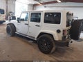 2016 Jeep Wrangler Unlimited — photo 3 of 16 | VIN 1C4BJWEG0GL333421